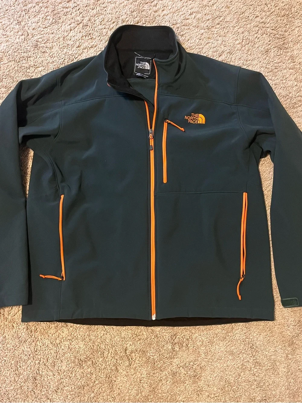 The North Face Men's Dark Green Jacket with Orange Trim